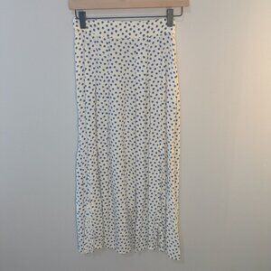 White with blue polka dots skirt